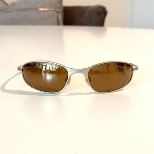 Oakley Brushed Gold Frame Sunglasses with Brown Lenses